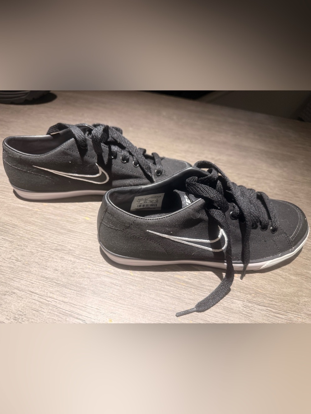 Nike Black Canvas Sneakers with White Swoosh Accent